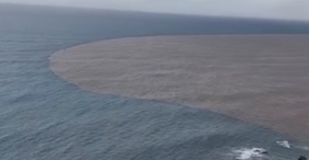 Mancha castanha no mar revela impacto da chuva intensa (com v&iacute;deo)